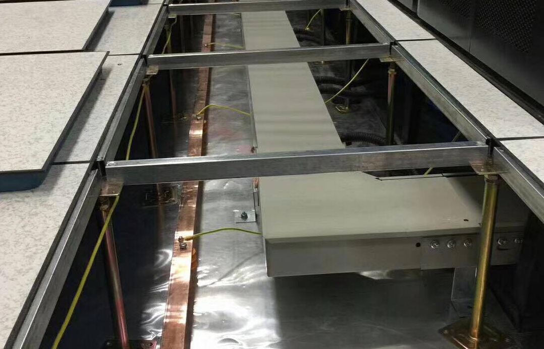 ESD raised access flooring system with raised floor panels and understructure